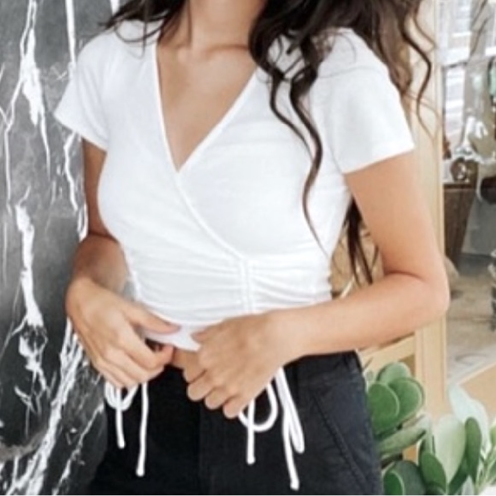 New White v-neck knit top.Size L